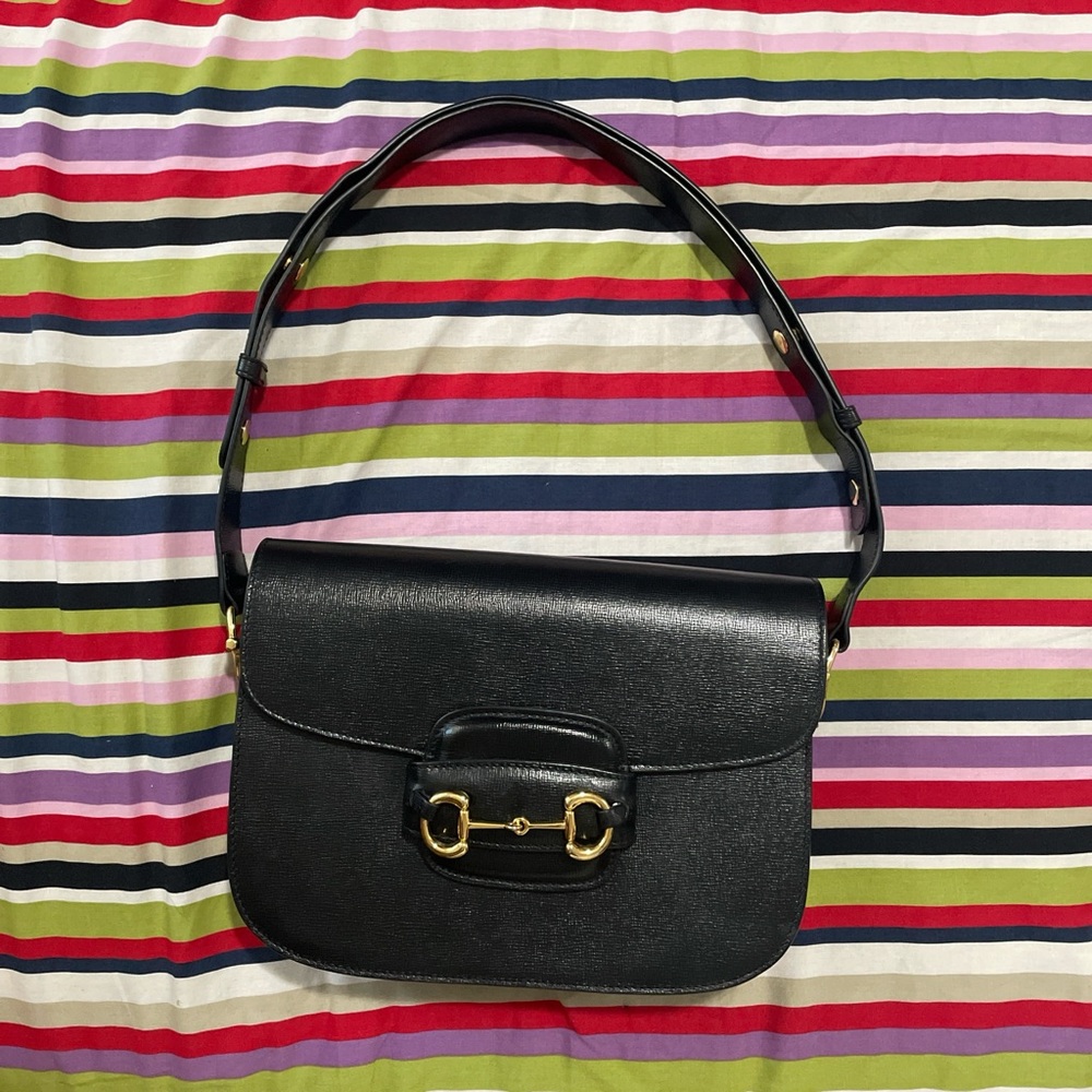 Gucci Black Leather Bag with Gold Accents